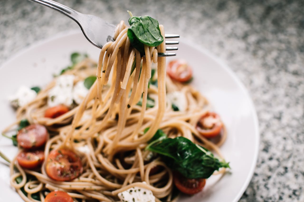 Photo by Lisa Fotios: https://www.pexels.com/photo/selective-focus-photography-of-pasta-with-tomato-and-basil-1279330/